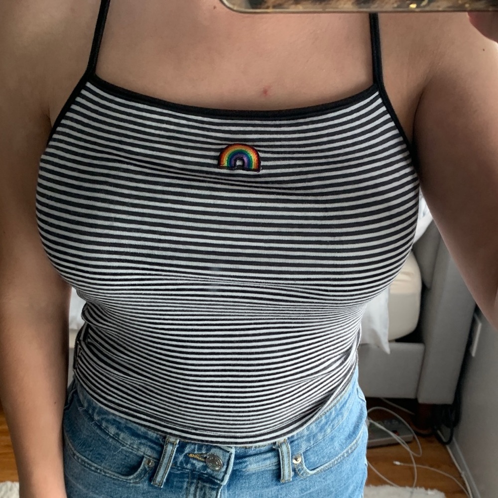 Striped tank with rainbow embroidery.